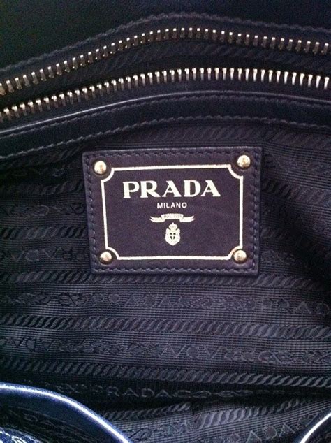 do all real prada purses have printed interiors|Prada knockoff purses.